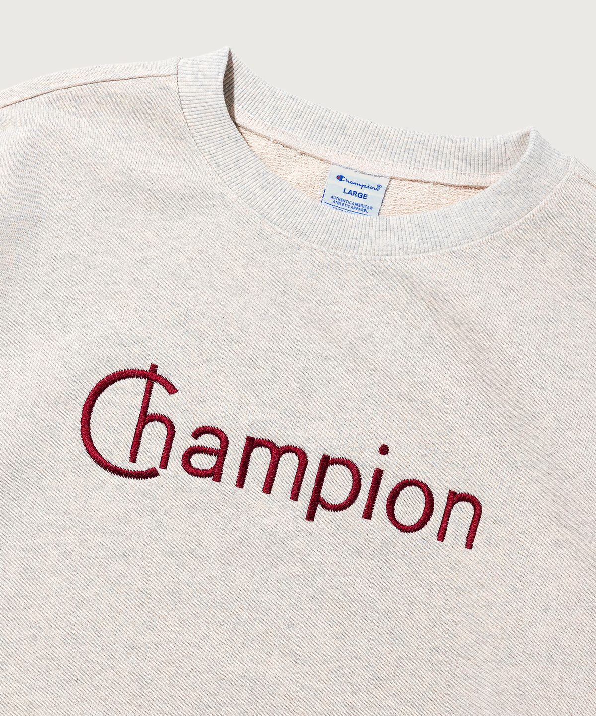 챔피온(CHAMPION) 그래픽 로고 루즈핏 스웨트셔츠 Oatmeal