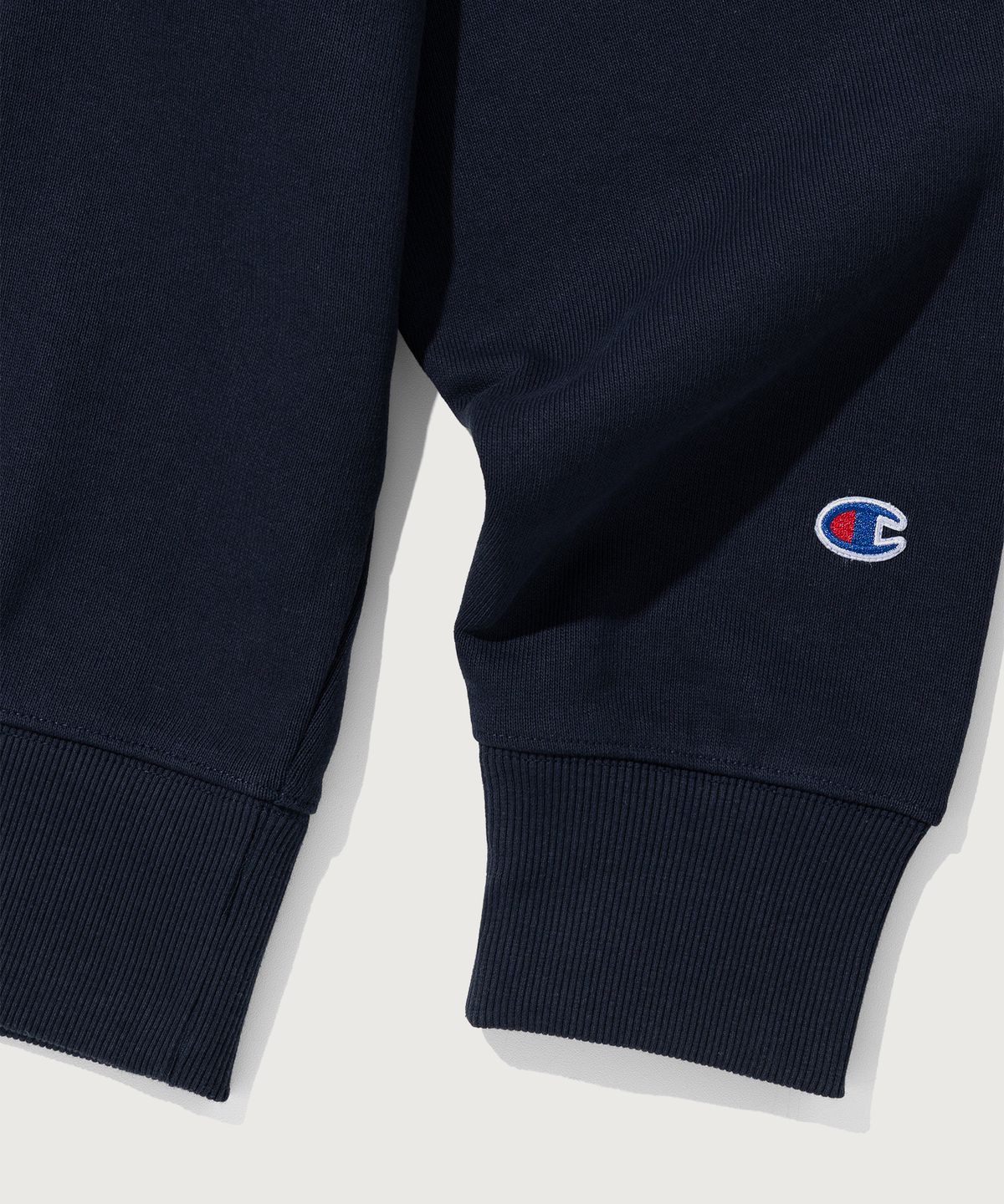 챔피온(CHAMPION) 그래픽 로고 루즈핏 스웨트셔츠 Navy