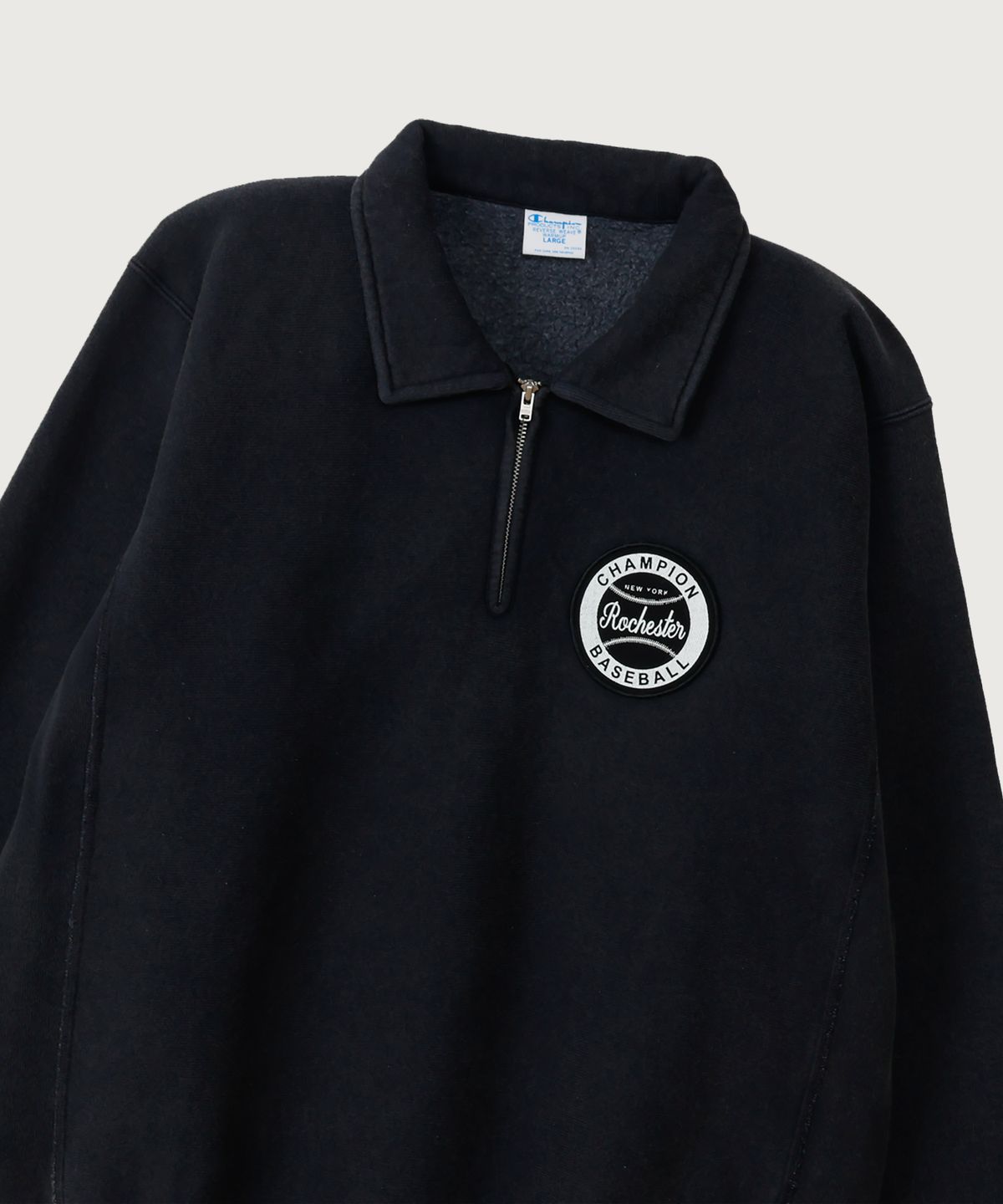 챔피온(CHAMPION) 리버스위브 BASEBALL 패치 레귤러핏 기모 하프 집업 Off Black