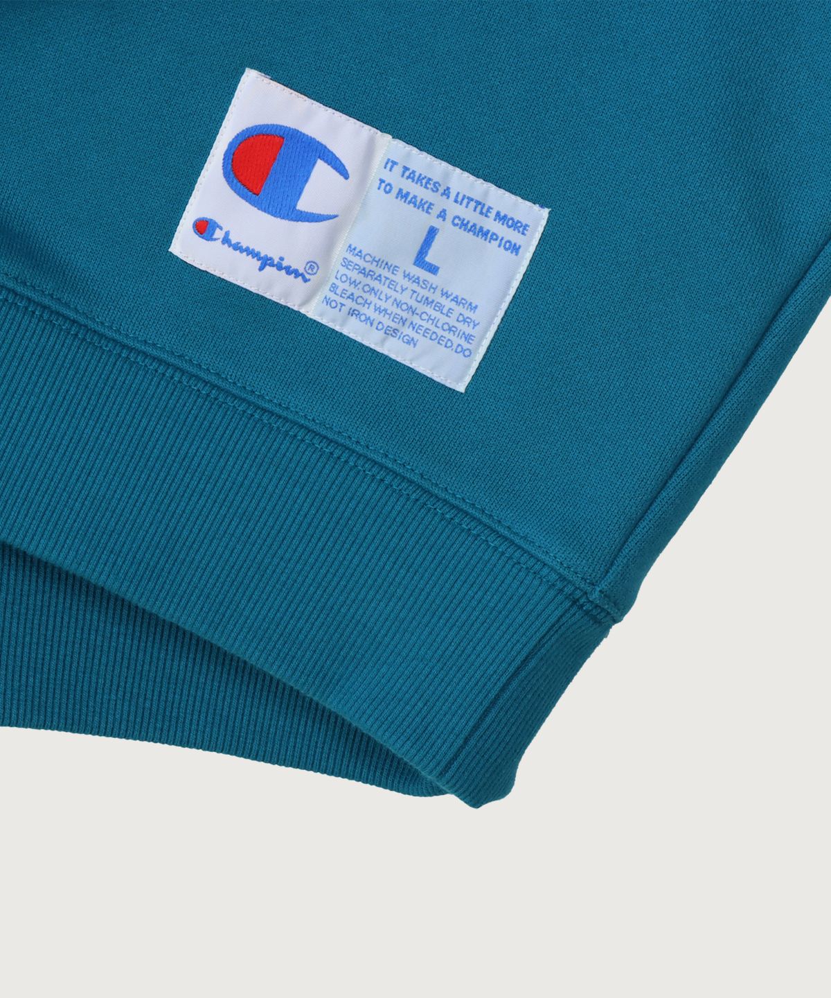 챔피온(CHAMPION) C로고 오버핏 조그택 스웨트셔츠 Blue Green