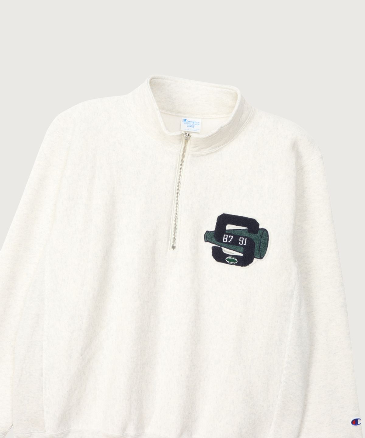 챔피온(CHAMPION) 리버스위브 블루택 루즈핏 컬리지 하프 집업 Oatmeal
