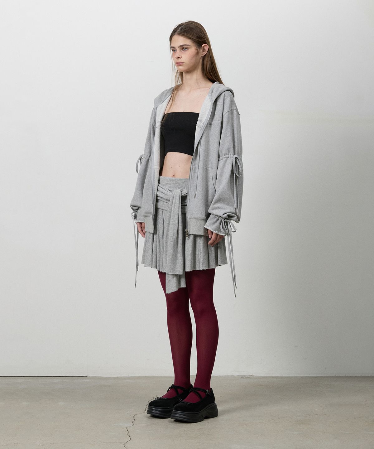 쓰리투에이티(THREE TO EIGHTY) RIBBON KNOTTED MINI SKIRT M.GREY