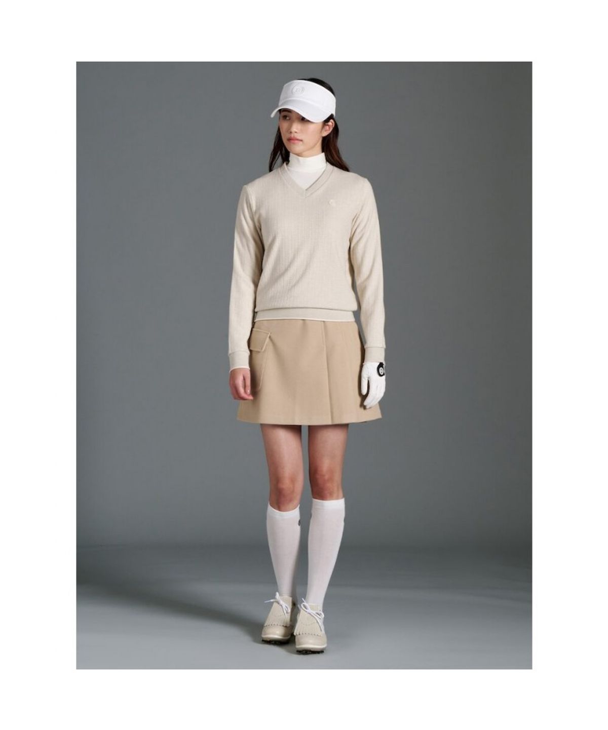 빈폴골프(BEANPOLE GOLF) 여성 기모 브이넥 블루종핏 티셔츠 - 베이지