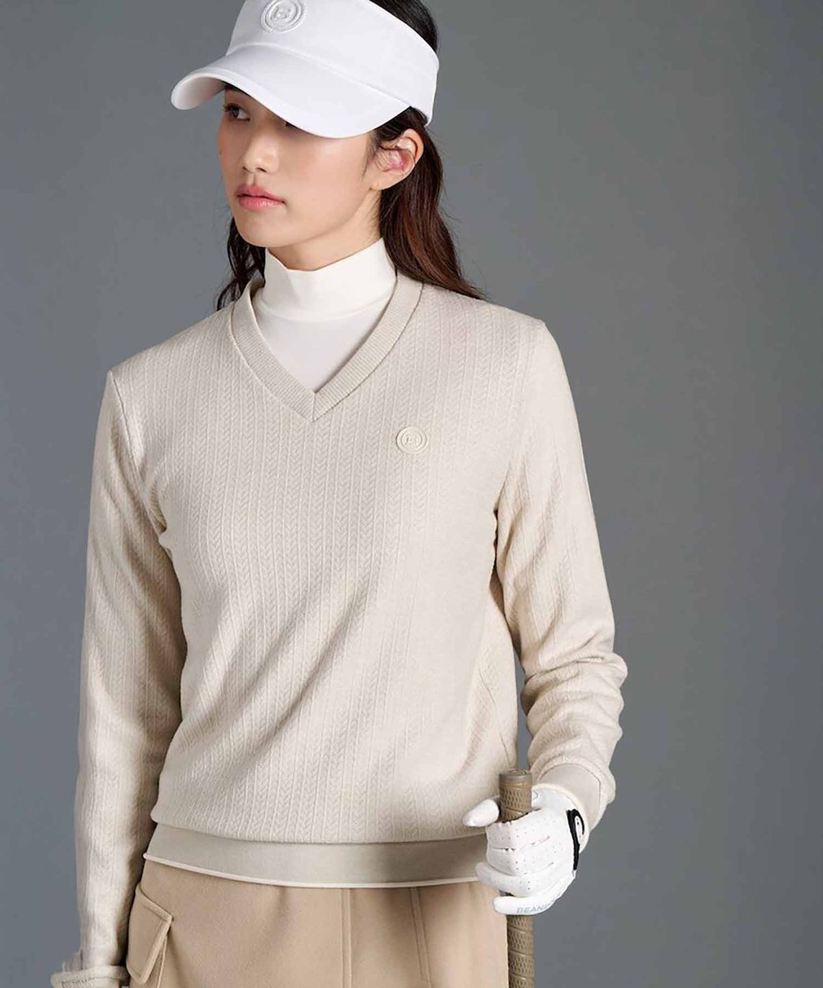 빈폴골프(BEANPOLE GOLF) 여성 기모 브이넥 블루종핏 티셔츠 - 베이지