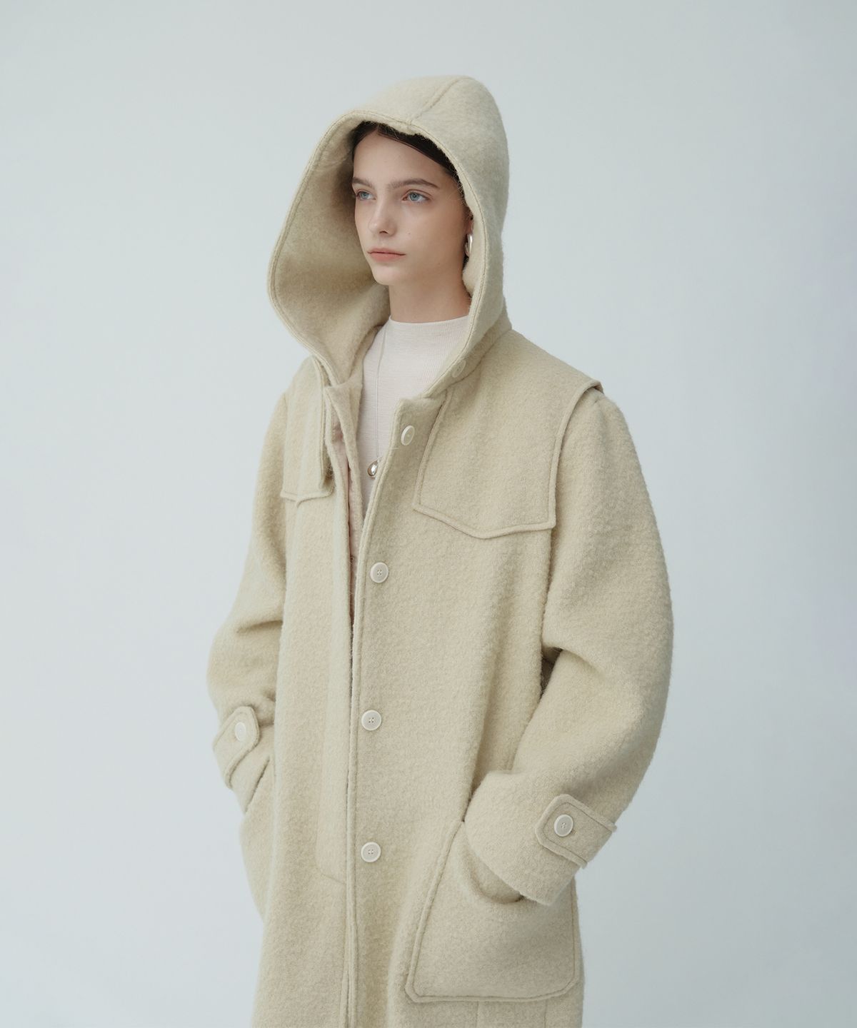 뮤제(MUSEE) OCRE Alpaca Boucle Wool Hooded Long Coat_Butter