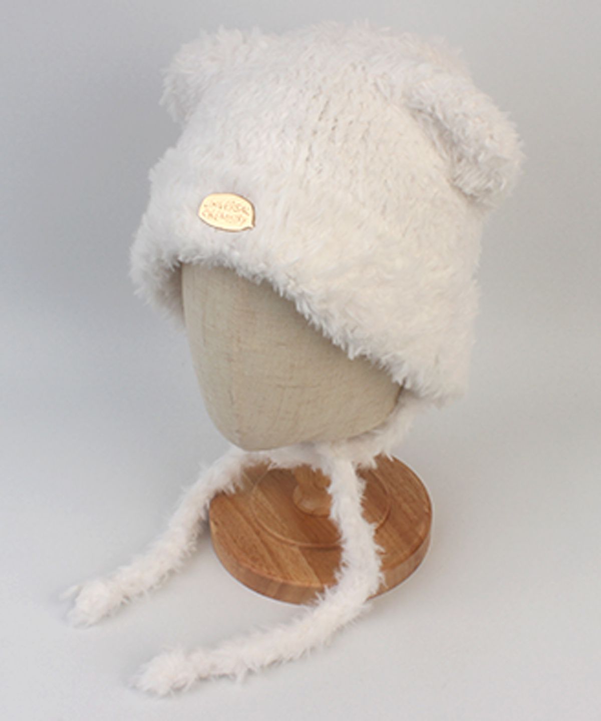 유니버셜 케미스트리(UNIVERSAL CHEMISTRY) Bear Fur White Bonnet Hat 털모자