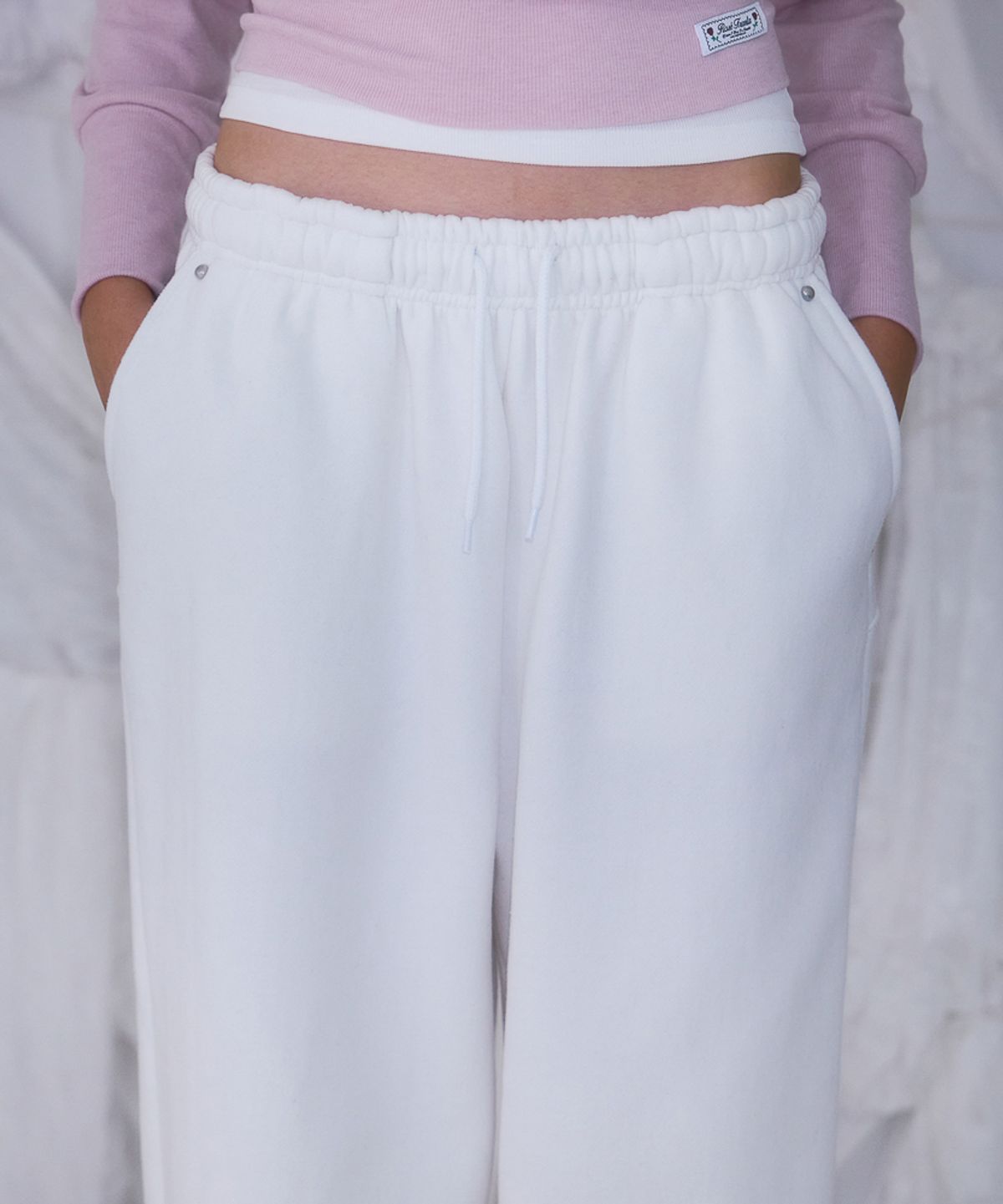 로제프란츠(ROSEFRANTZ) Back Point 2Way Sweatpants [Ivory]