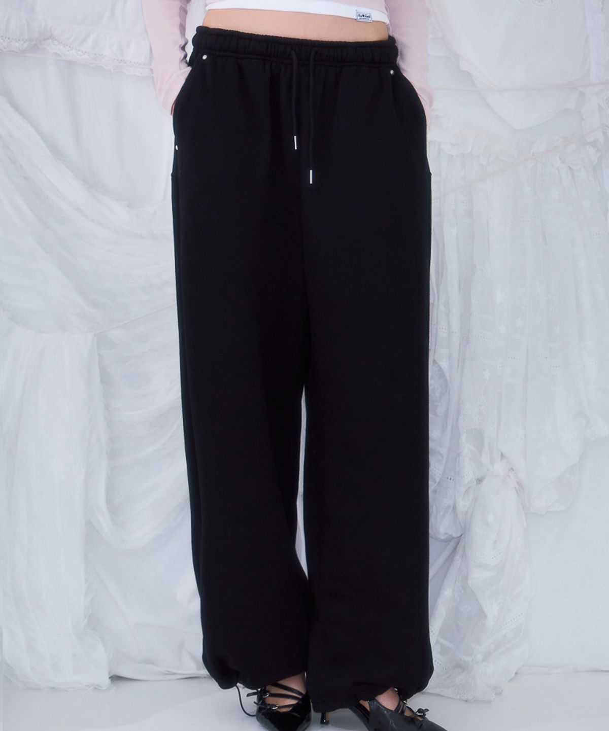 로제프란츠(ROSEFRANTZ) Back Point 2Way Sweatpants [Black]