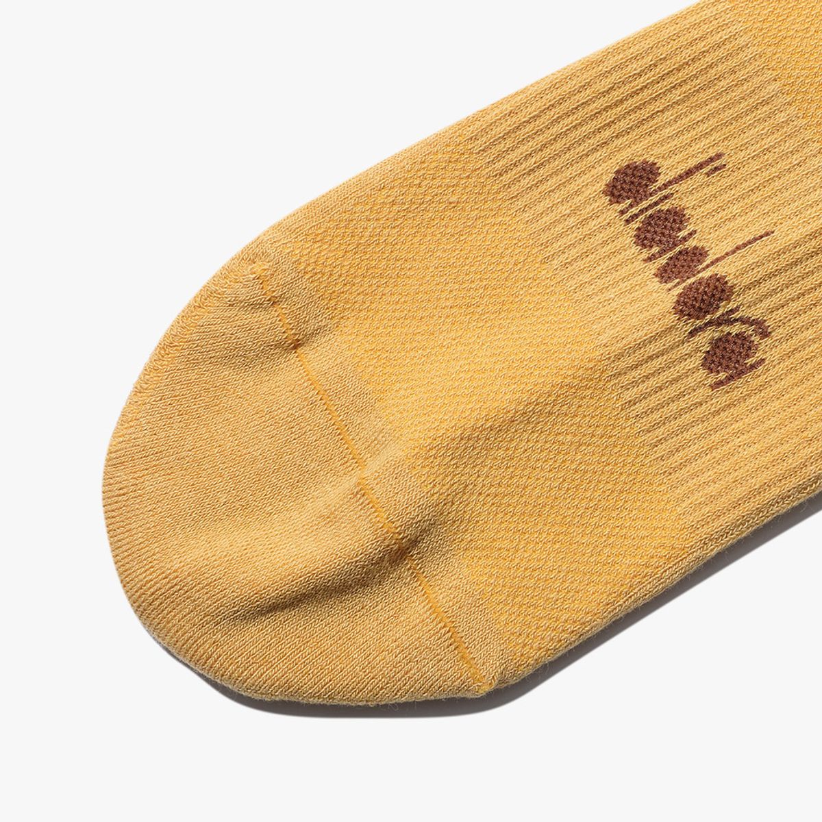 디아도라(diadora) 리피트 로고 미드 삭스 YELLOW