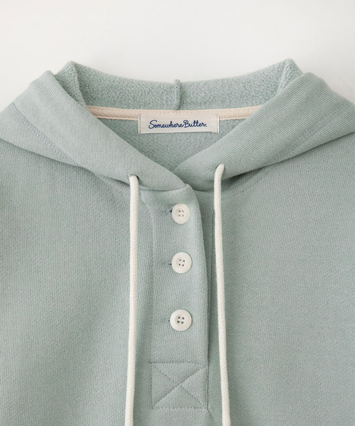 썸웨어버터(SOMEWHEREBUTTER) Bold Logo Button Hoodie - Pistachio