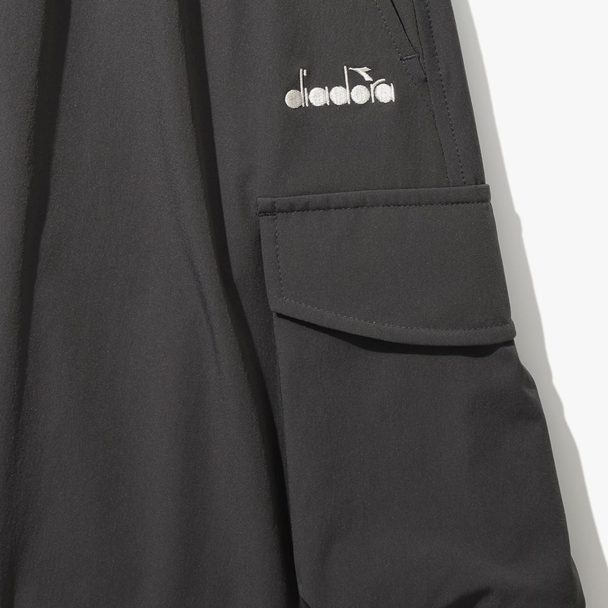 디아도라(diadora) 모르비 기모 카고 우븐 스커트 GREY