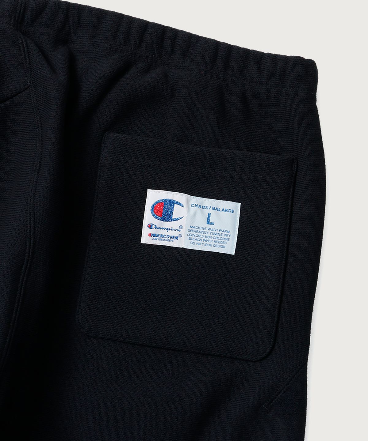 챔피온(CHAMPION) 챔피온 X 언더커버 리버스위브 스트럭처드 스웨트 팬츠 Black