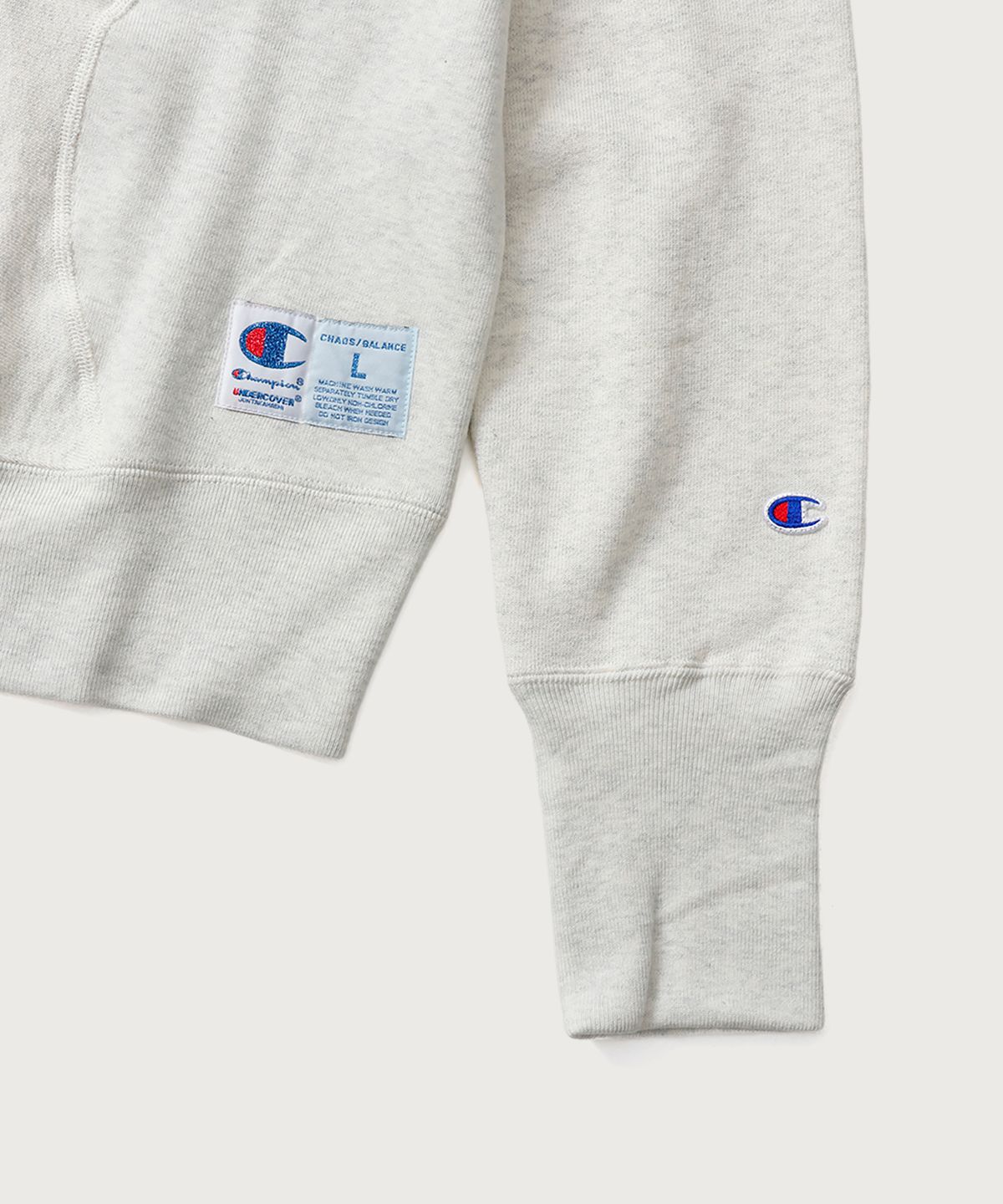챔피온(CHAMPION) 챔피온 X 언더커버 리버스위브 스트럭처드 스웨트셔츠 Oatmeal