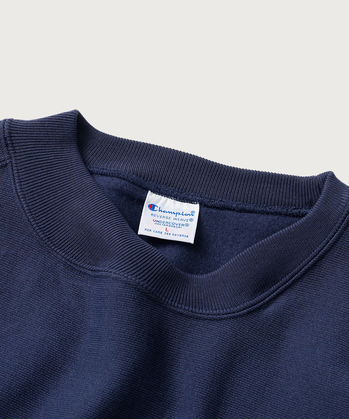 챔피온(CHAMPION) 챔피온 X 언더커버 리버스위브 스트럭처드 스웨트셔츠 Dark Navy