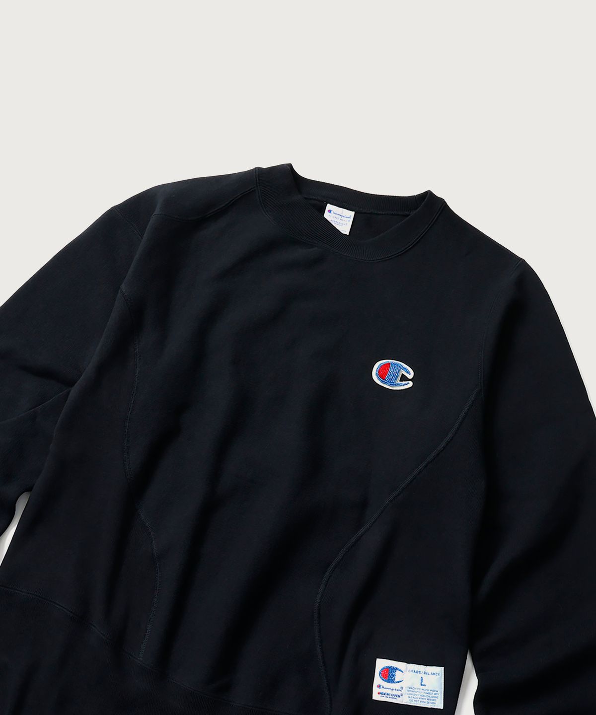 챔피온(CHAMPION) 챔피온 X 언더커버 리버스위브 스트럭처드 스웨트셔츠 Black