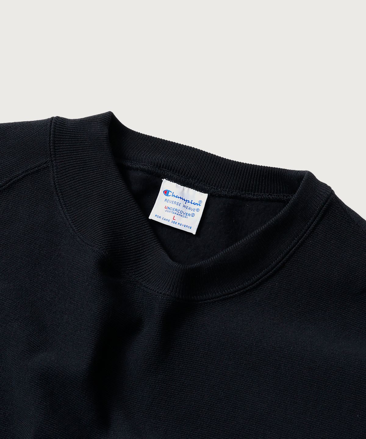 챔피온(CHAMPION) 챔피온 X 언더커버 리버스위브 스트럭처드 스웨트셔츠 Black