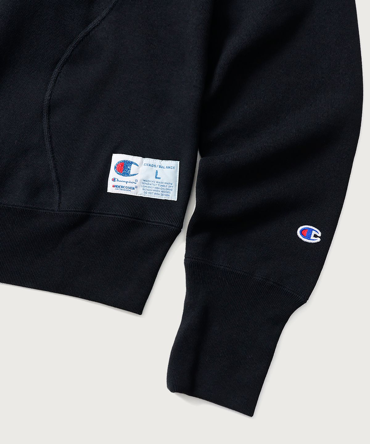 챔피온(CHAMPION) 챔피온 X 언더커버 리버스위브 스트럭처드 스웨트셔츠 Black
