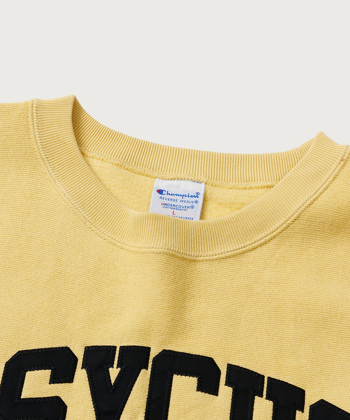 챔피온(CHAMPION) 챔피온 X 언더커버 리버스위브 PSYCHO 스웨트셔츠 Cream Yellow