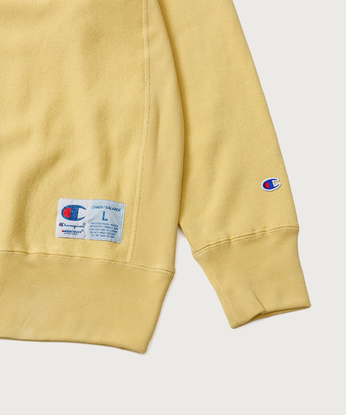 챔피온(CHAMPION) 챔피온 X 언더커버 리버스위브 PSYCHO 스웨트셔츠 Cream Yellow