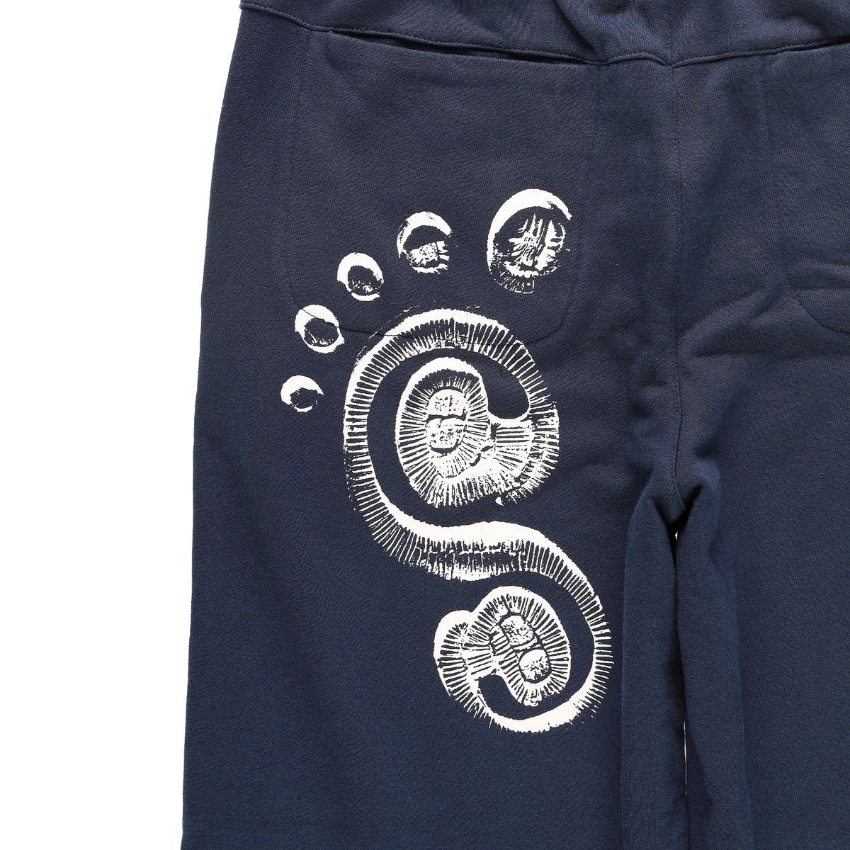 더왈드(THEWARLD) FOOT PRINT LOGO SWEAT PANTS NAVY