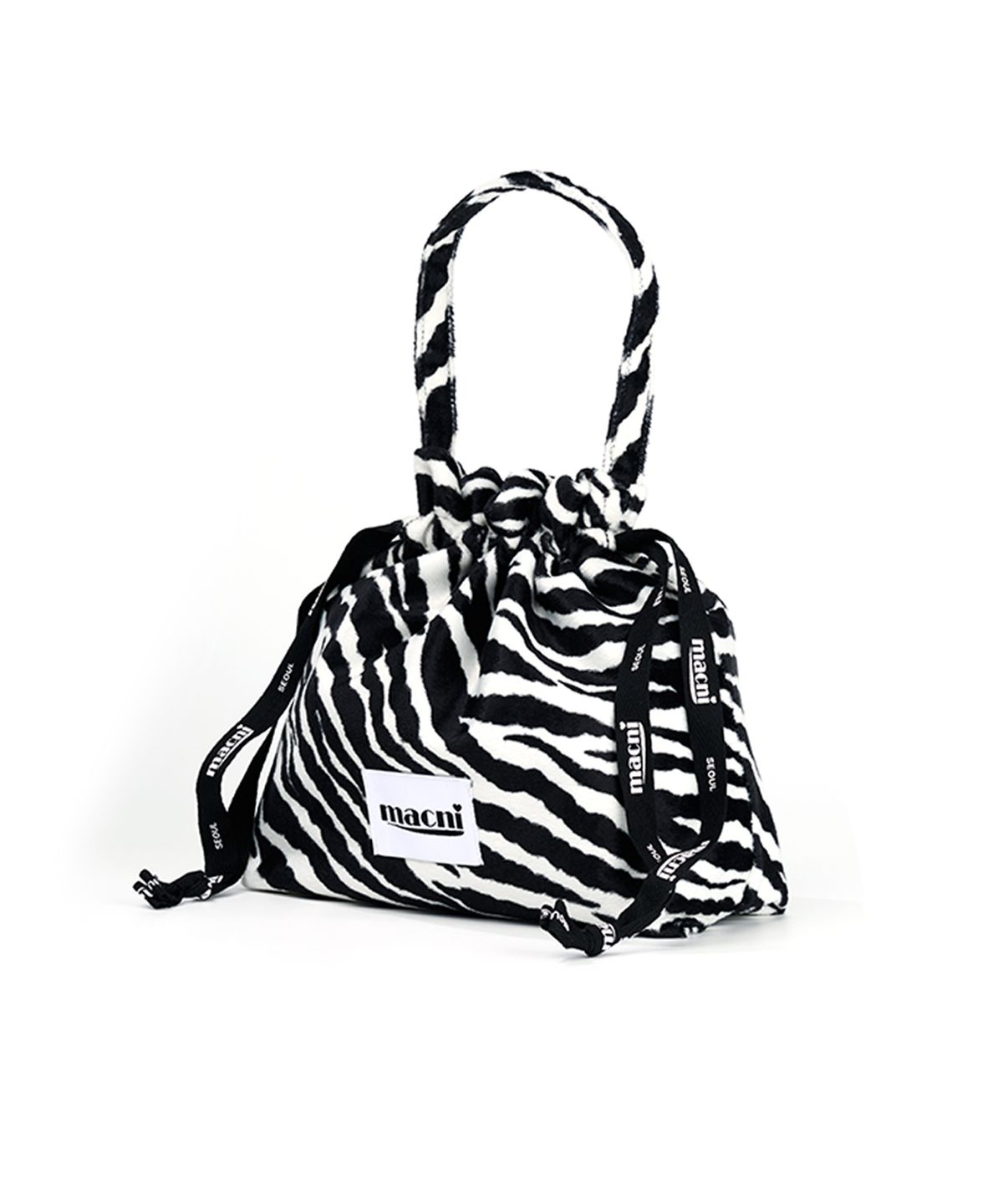 마크니(MACNI) ZEBRA STRING POUCH BAG WHITE