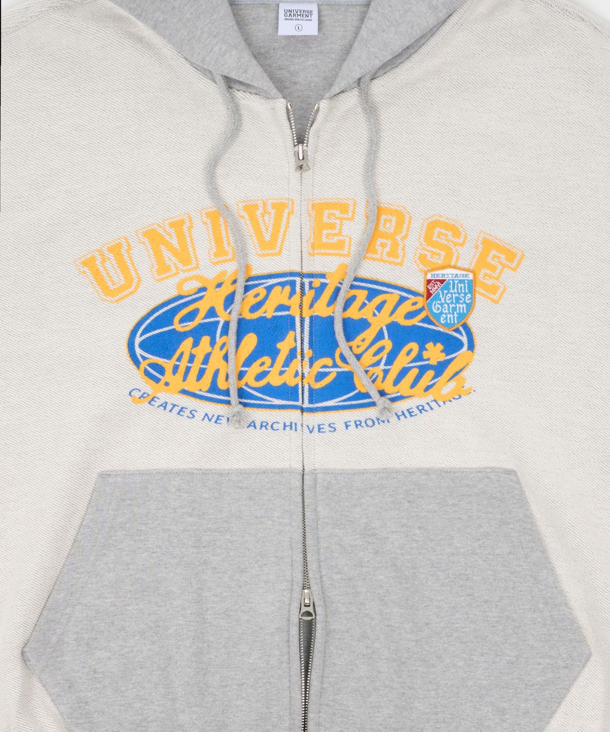 유니버스 가먼트(UNIVERSE GARMENT) 유니버스 싸인 리버스 후드 집업_Melange Grey