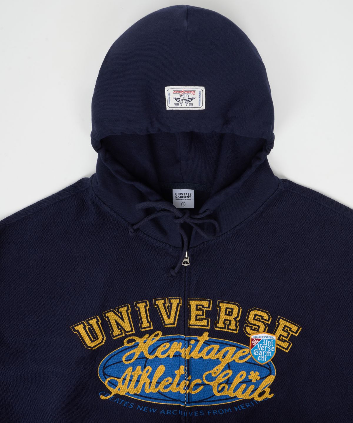 유니버스 가먼트(UNIVERSE GARMENT) 유니버스 싸인 리버스 후드 집업_Navy