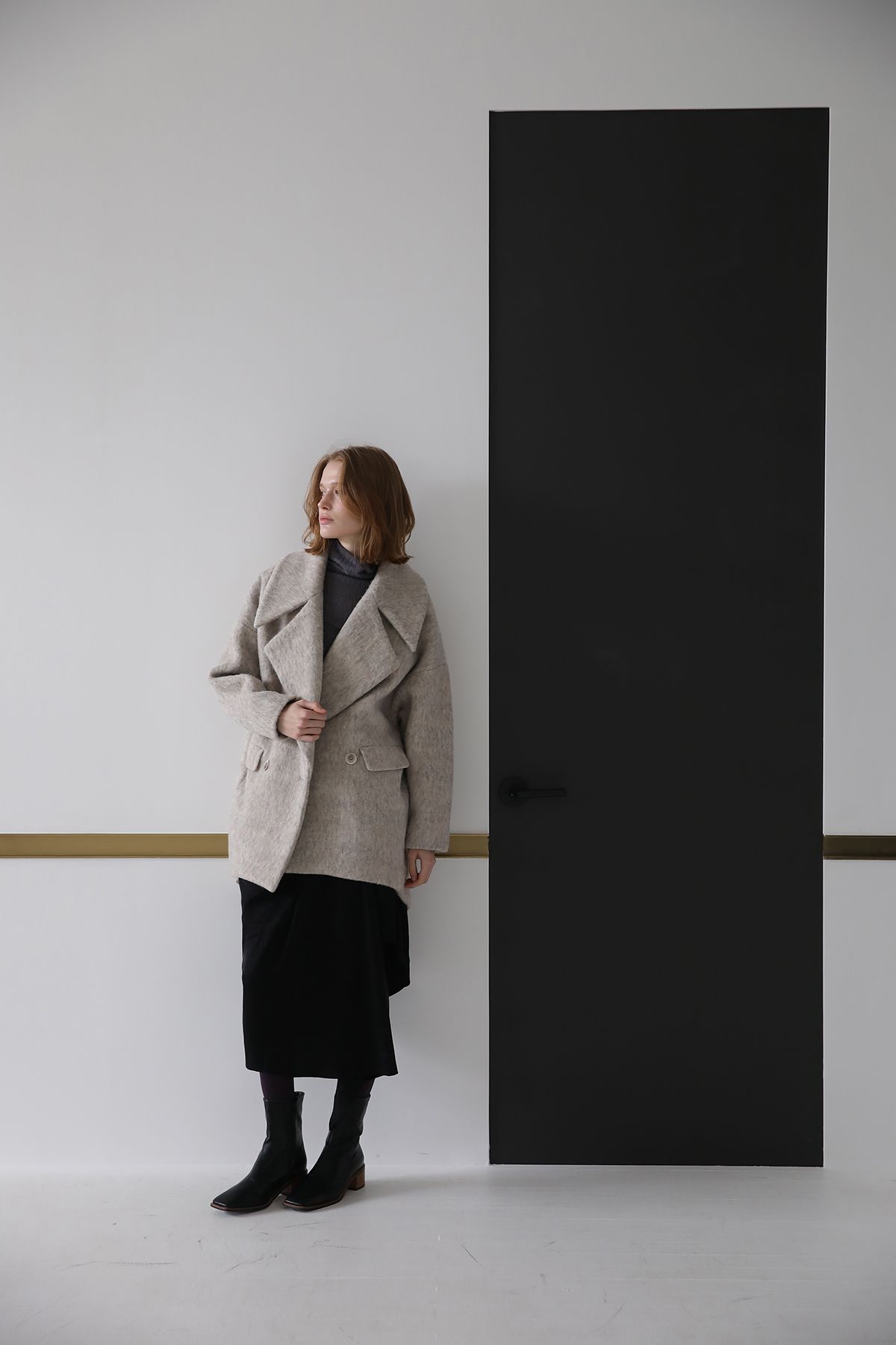 까이에(CAHIERS) 드레이프 랩 블랙 언밸런스 스커트