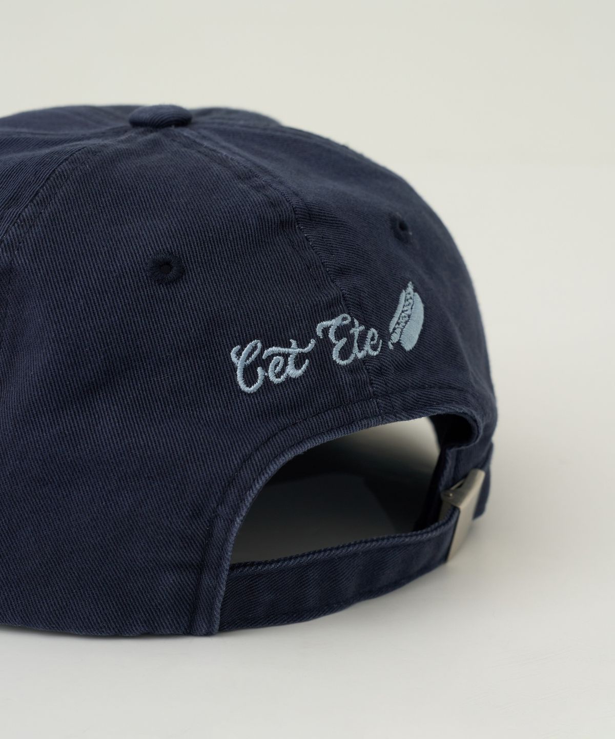 쎄떼떼(cet ete) 투톤 워시드 아치 엔젤 로고 Cap_네이비