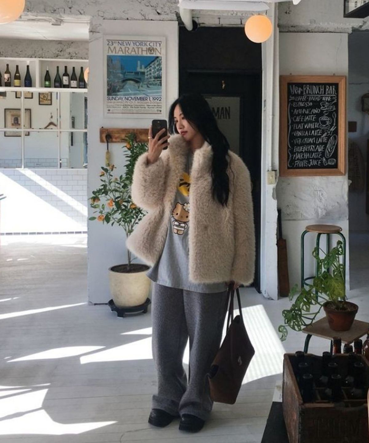 미쏘(MIXXO) 페이크퍼 하프 코트_MIWJLG111B