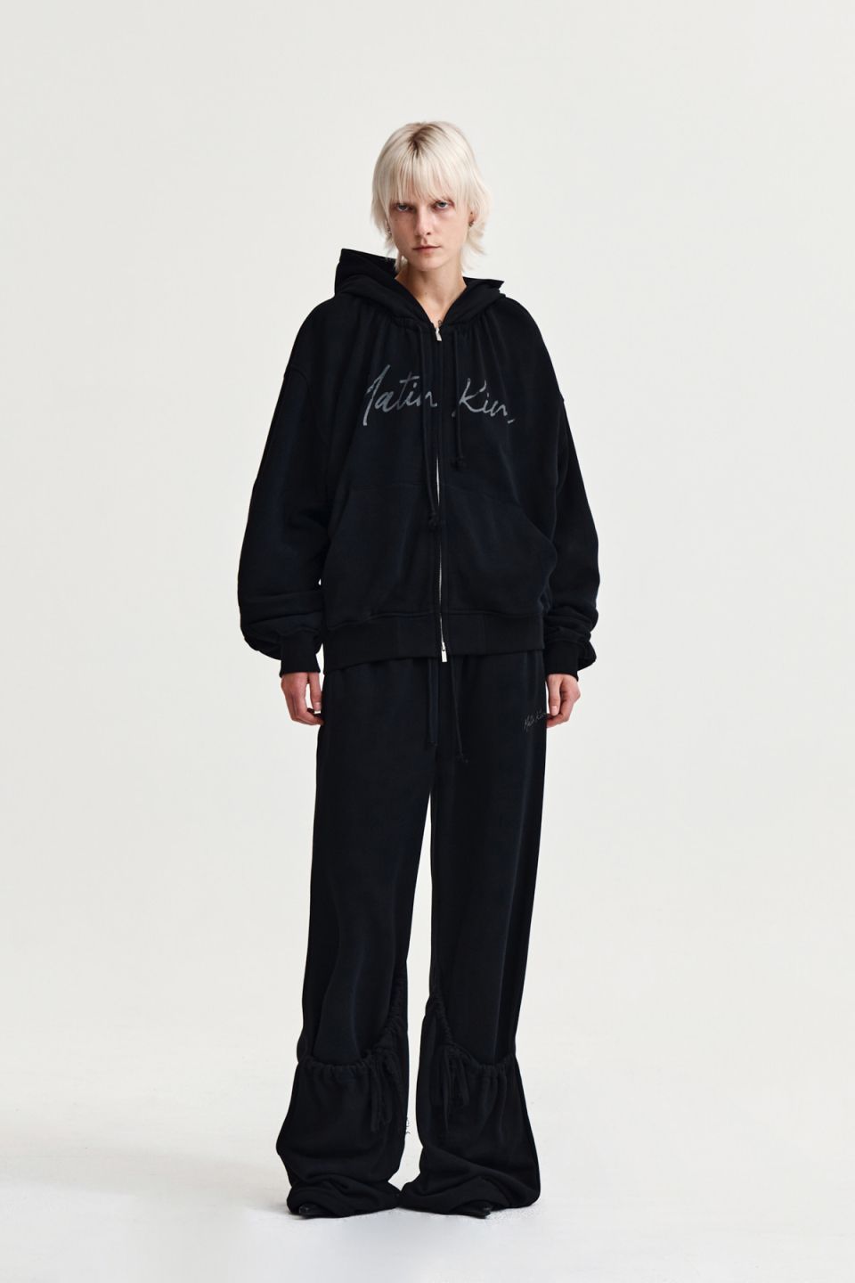 MUSINSA公式 | MATIN KIM DRAWSTRING POINT ZIP UP HOODY IN BLACK