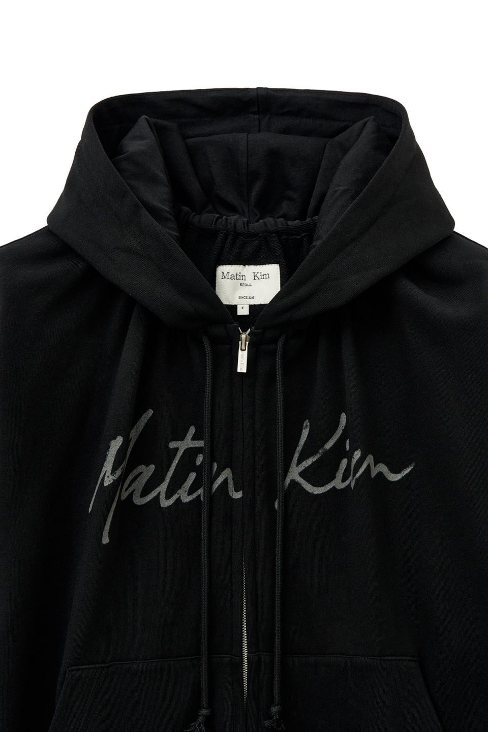 MUSINSA公式 | MATIN KIM DRAWSTRING POINT ZIP UP HOODY IN BLACK