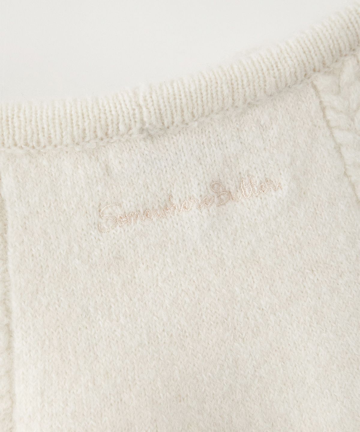 썸웨어버터(SOMEWHEREBUTTER) Alpaca Cable Mini Skirt - Ivory