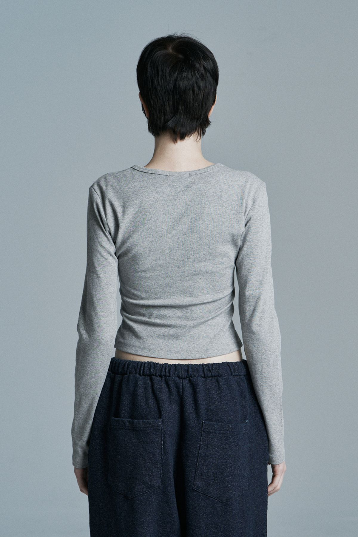 시너진(SYNERJYN) ROUND CROP LONG SLEEVE MELANGE