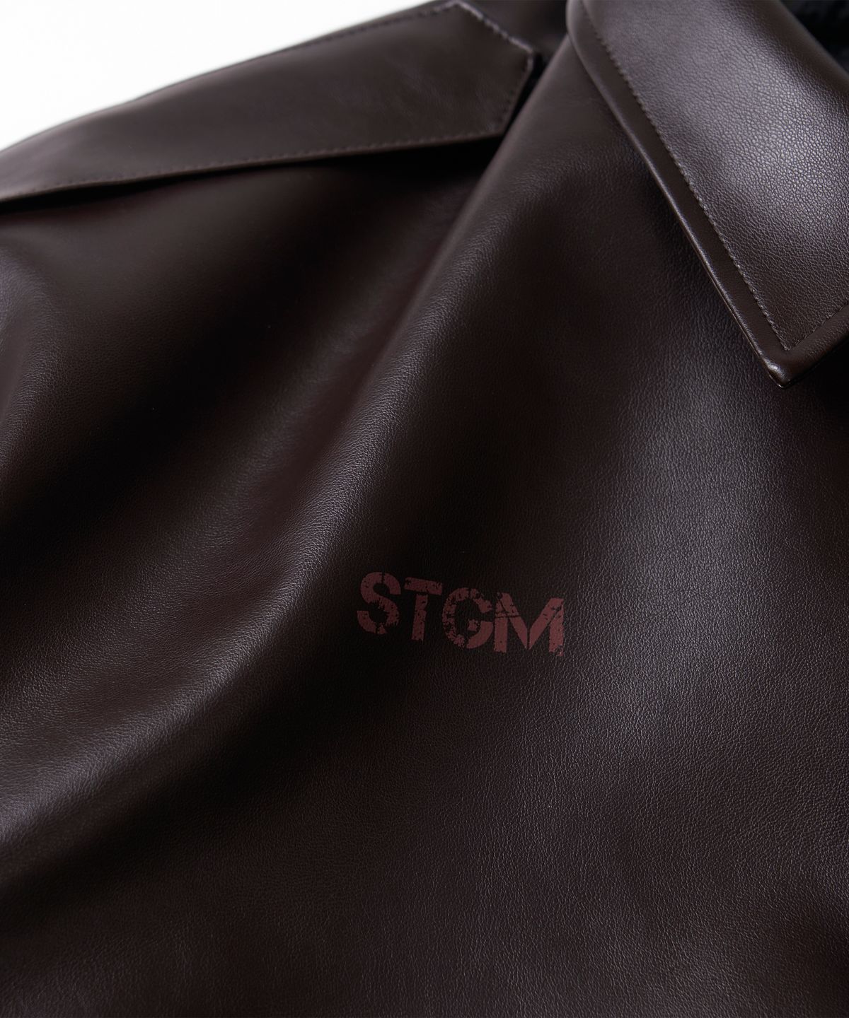 스티그마(STIGMA) A-2 OVERSIZED CROP FAUX LEATHER JACKET