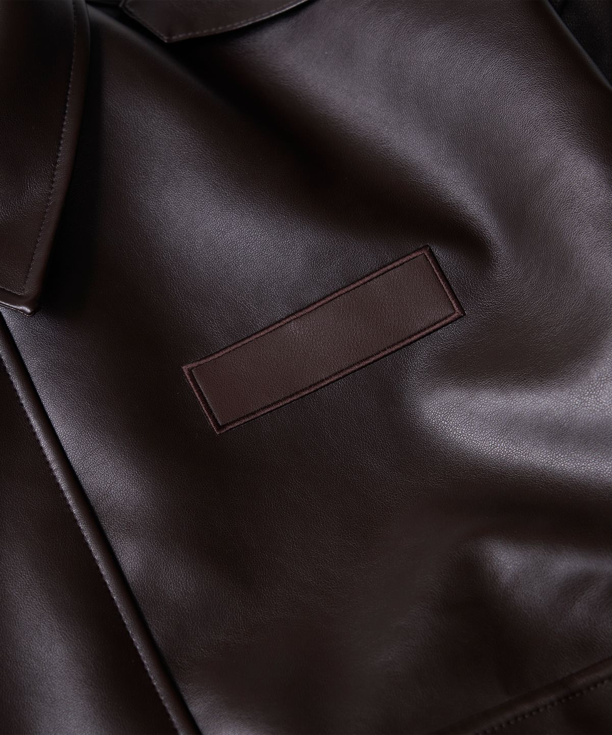 스티그마(STIGMA) A-2 OVERSIZED CROP FAUX LEATHER JACKET