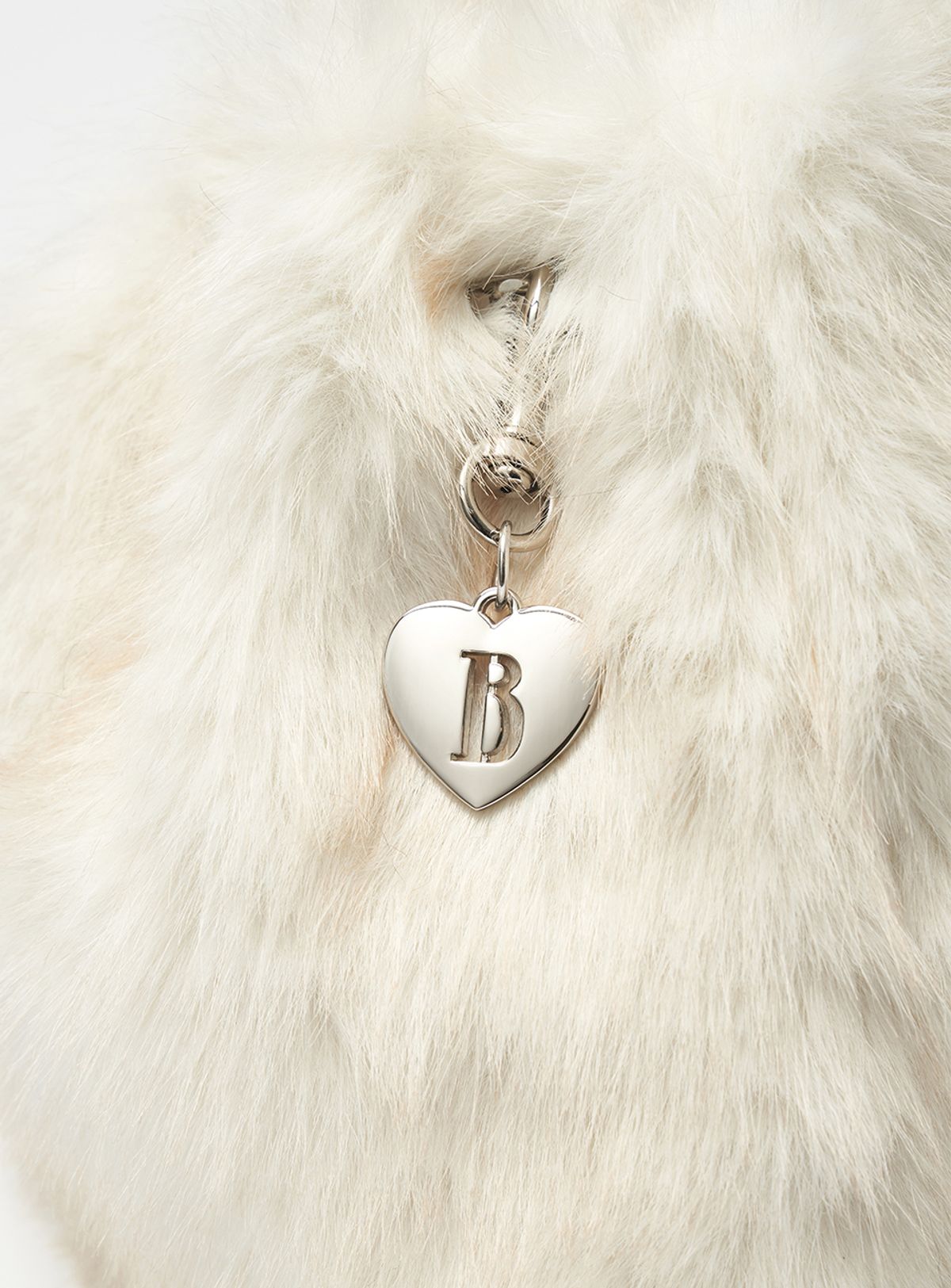 더바넷(THEBARNNET) Fur Drawstring Backpack_Ivory