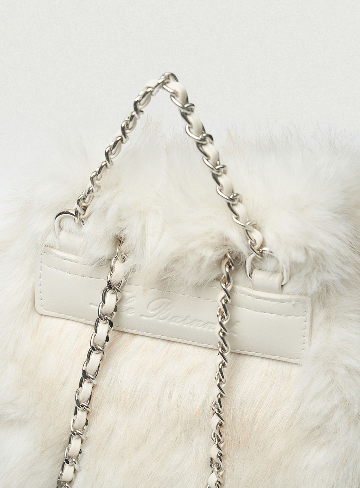 더바넷(THEBARNNET) Fur Drawstring Backpack_Ivory