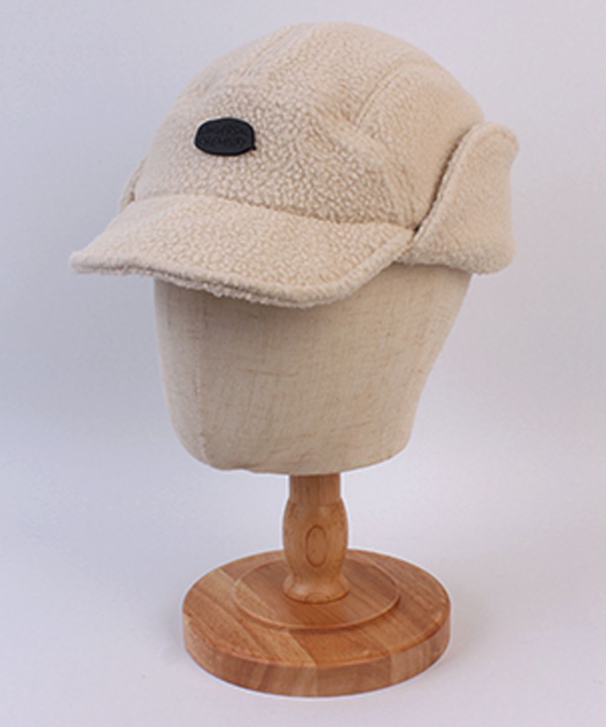 유니버셜 케미스트리(UNIVERSAL CHEMISTRY) Fleece Beige Half Earflap Cap  귀달이모자