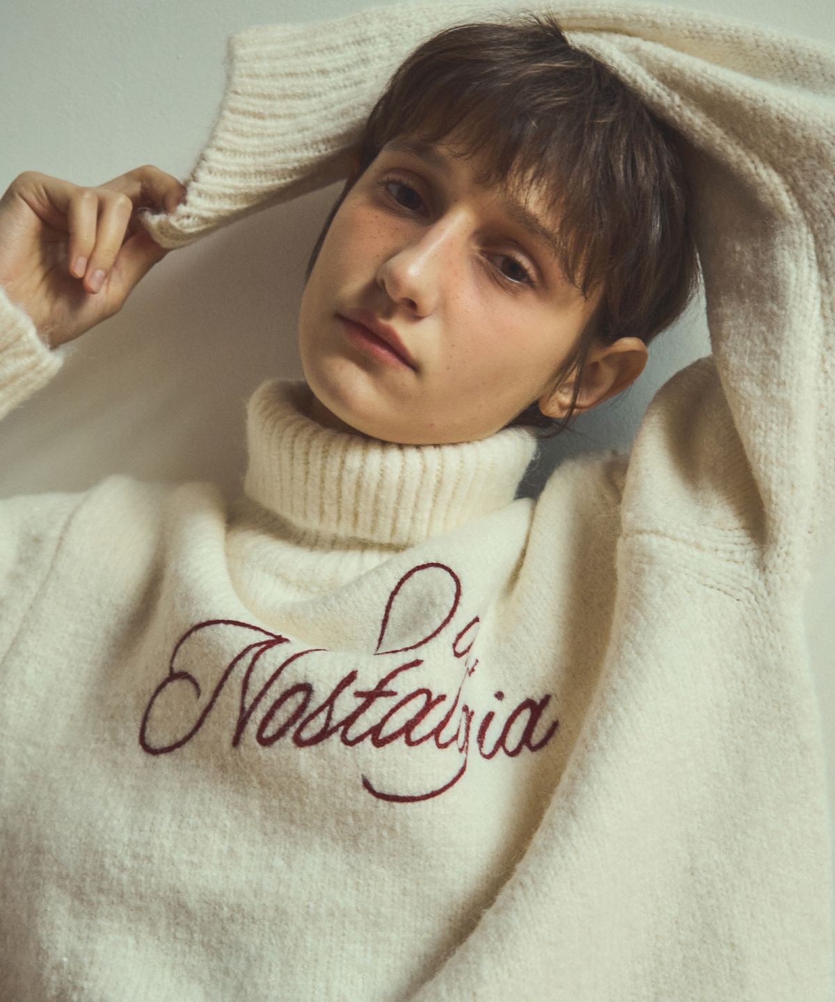 아우어노스텔지아(OURNOSTALGIA) our lettering turtleneck wool knit_Ivory