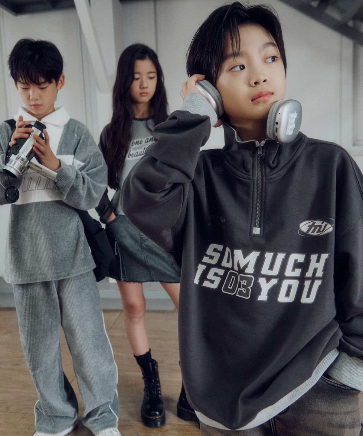 티미유(TMIU) 하프 집업 맨투맨