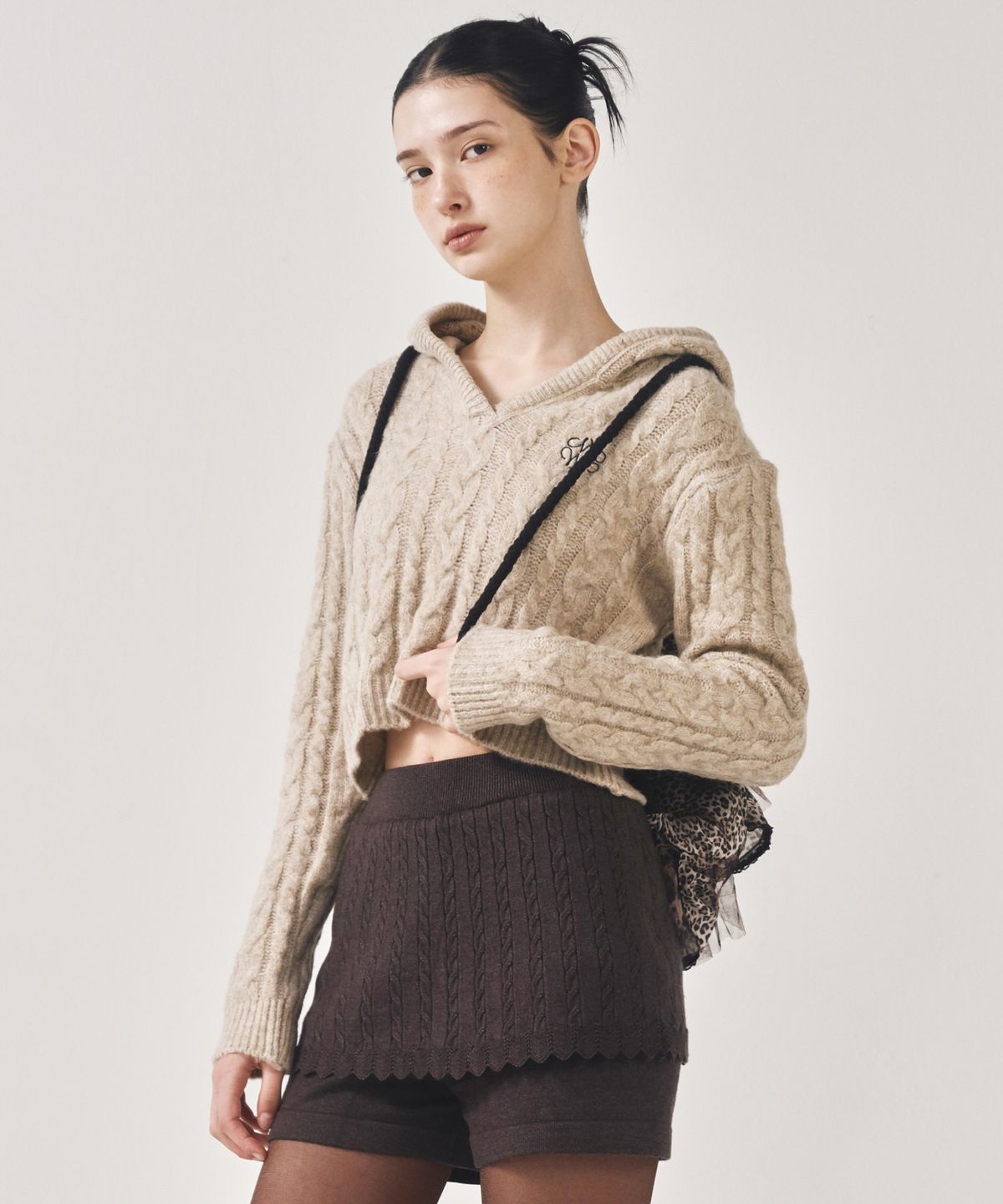 닉앤니콜(NICK&NICOLE) LEOPARD LAYERED STRING BACKPACK_BROWN