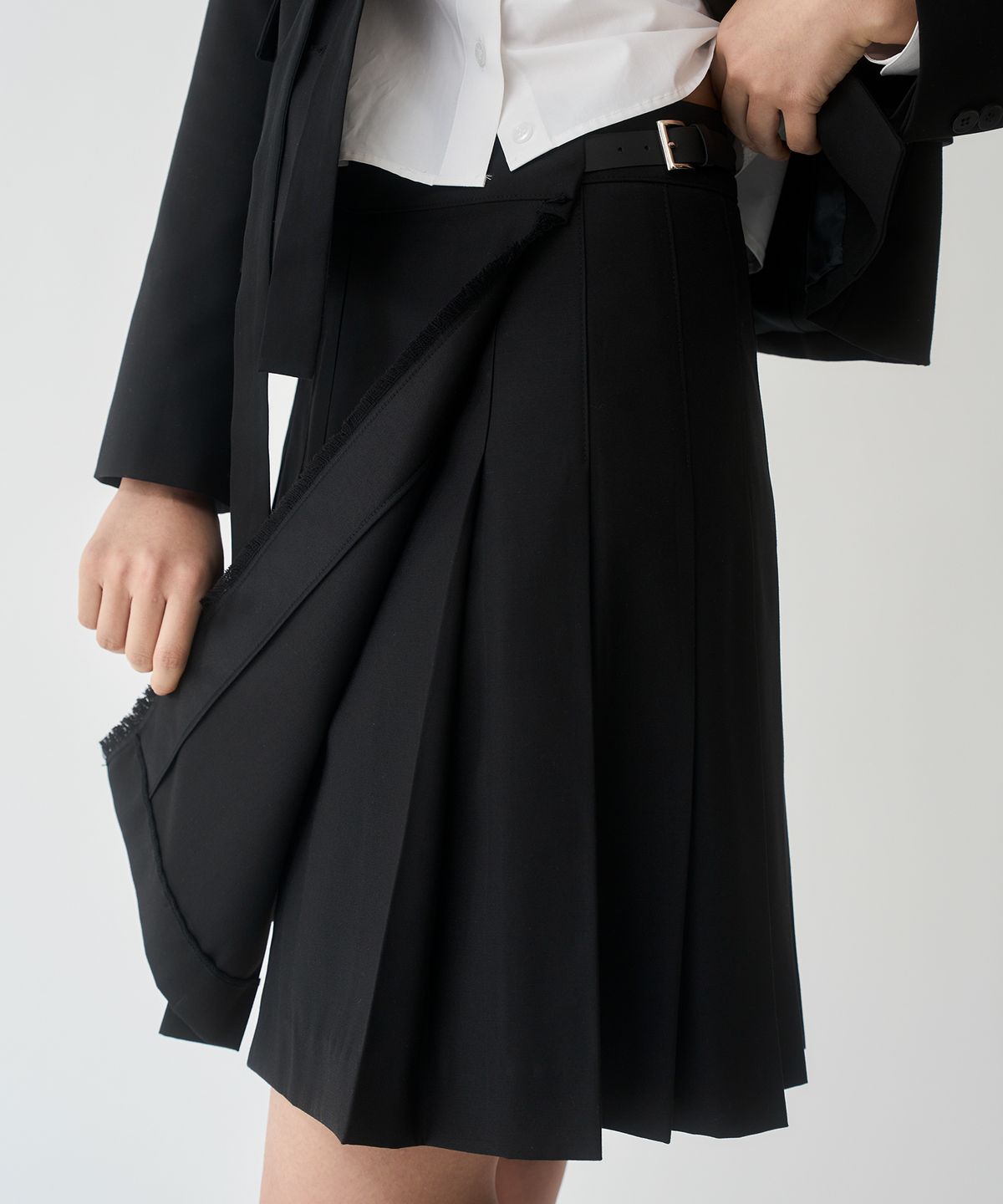 유심(YOUSHIM) 플리츠 울 킬트 스커트