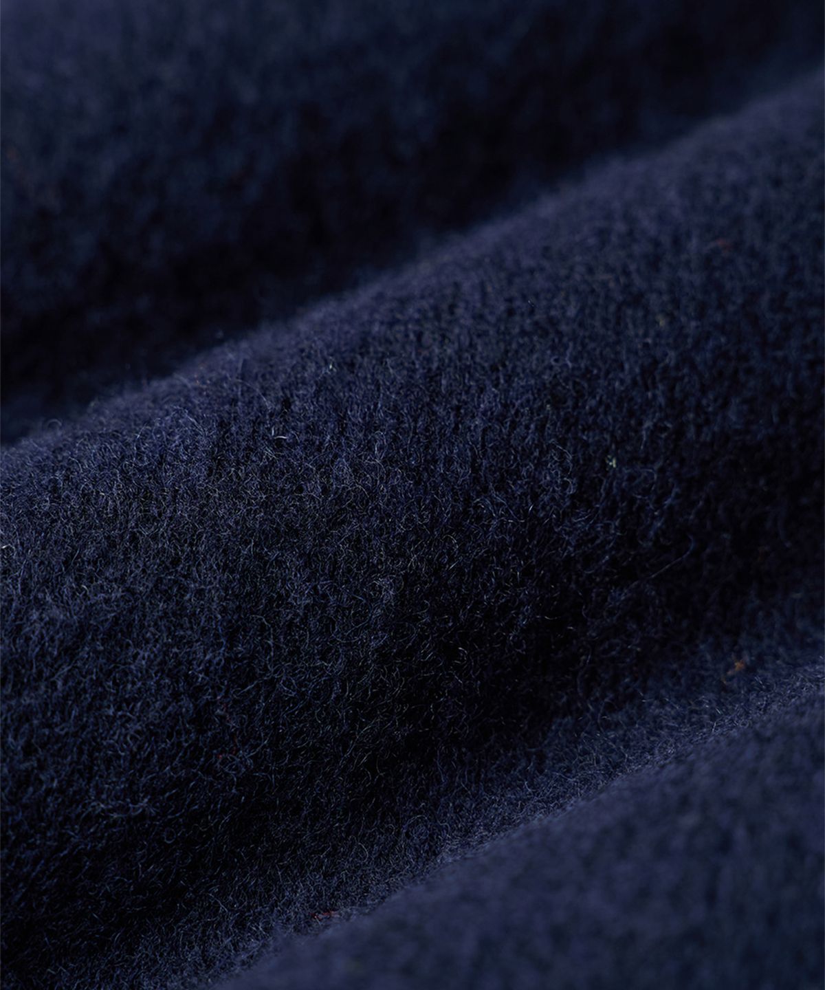 건지 울른스(Guernsey Woollens) 셔틀랜드울 브이넥 베스트 - 브러쉬드 네이비