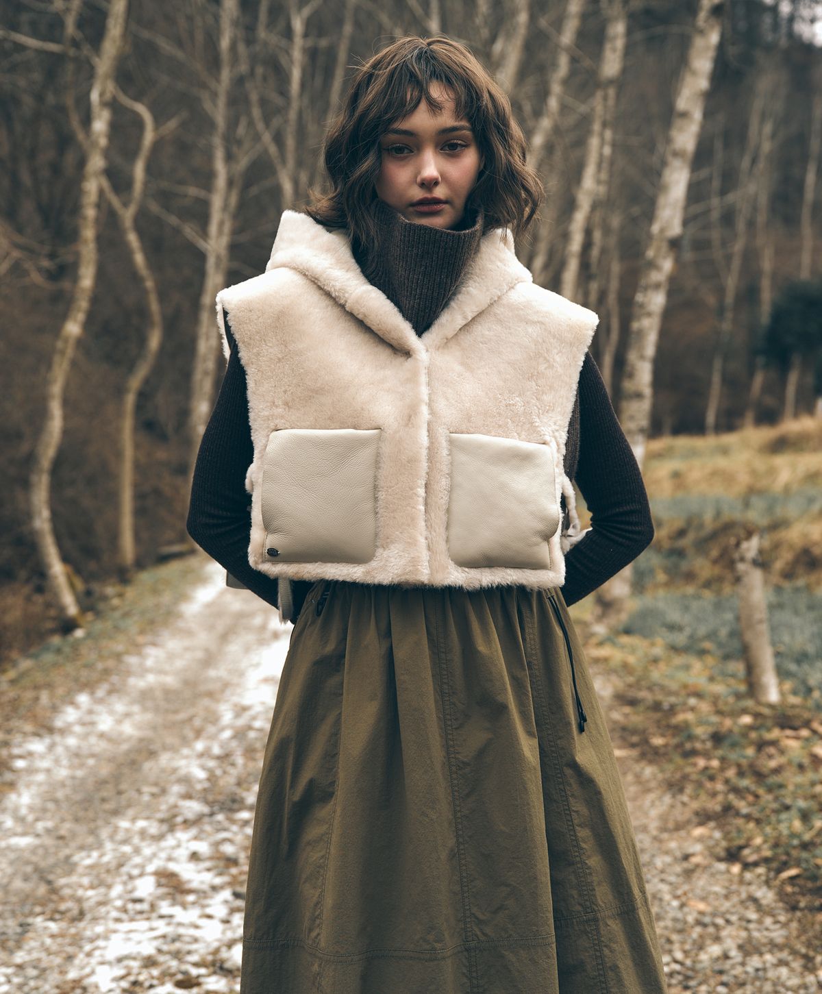 누크피터(NUUKFITTER) MOUTON FUR REVERSIBLE VEST_WOMEN [LIGHT BEIGE] 여성 리얼 무스탕 리버서블 후드 베스트 양털 조끼 라이트베이지