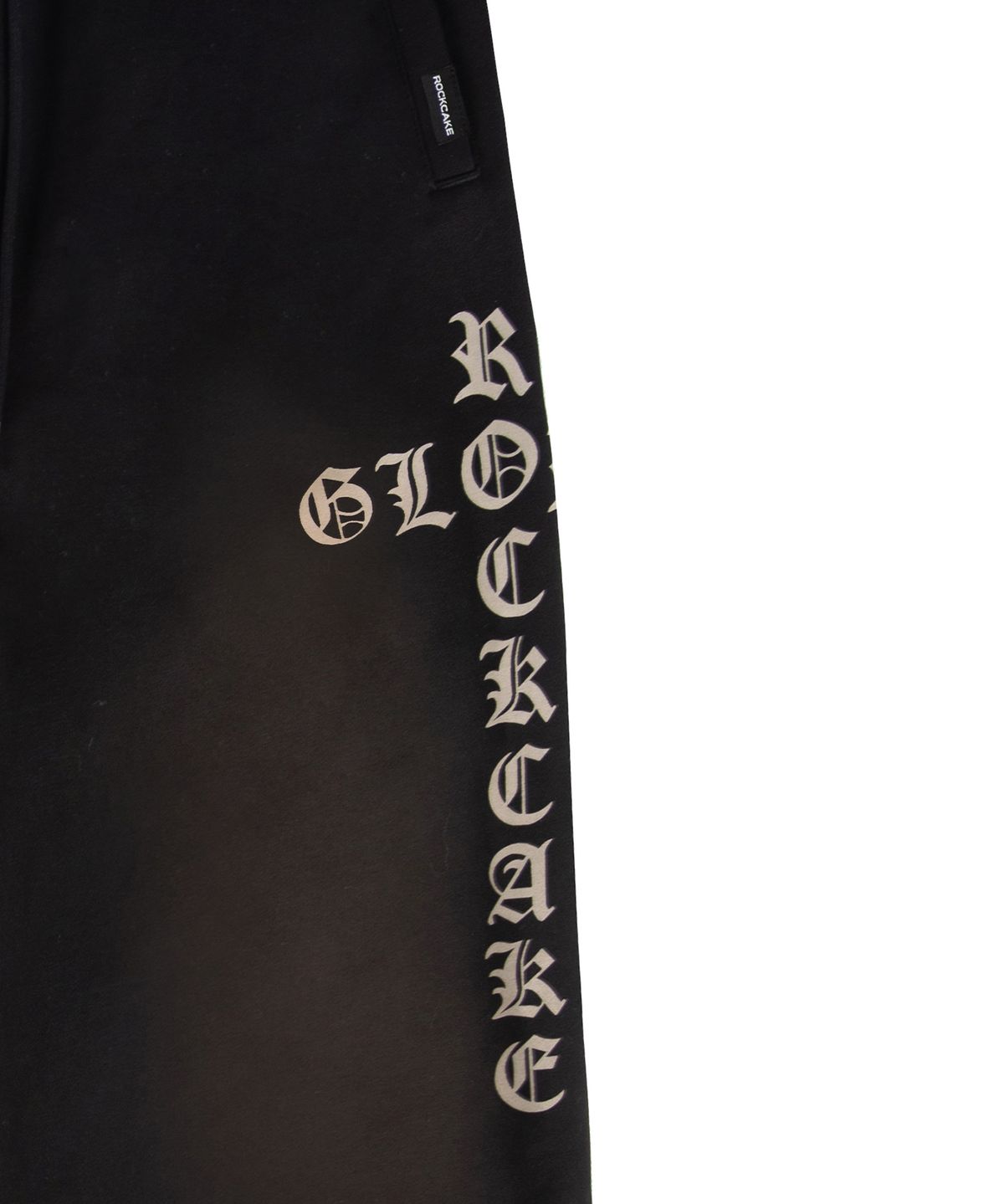 락케이크(ROCKCAKE) Washed Cross Lettering 2way Jogger - Black