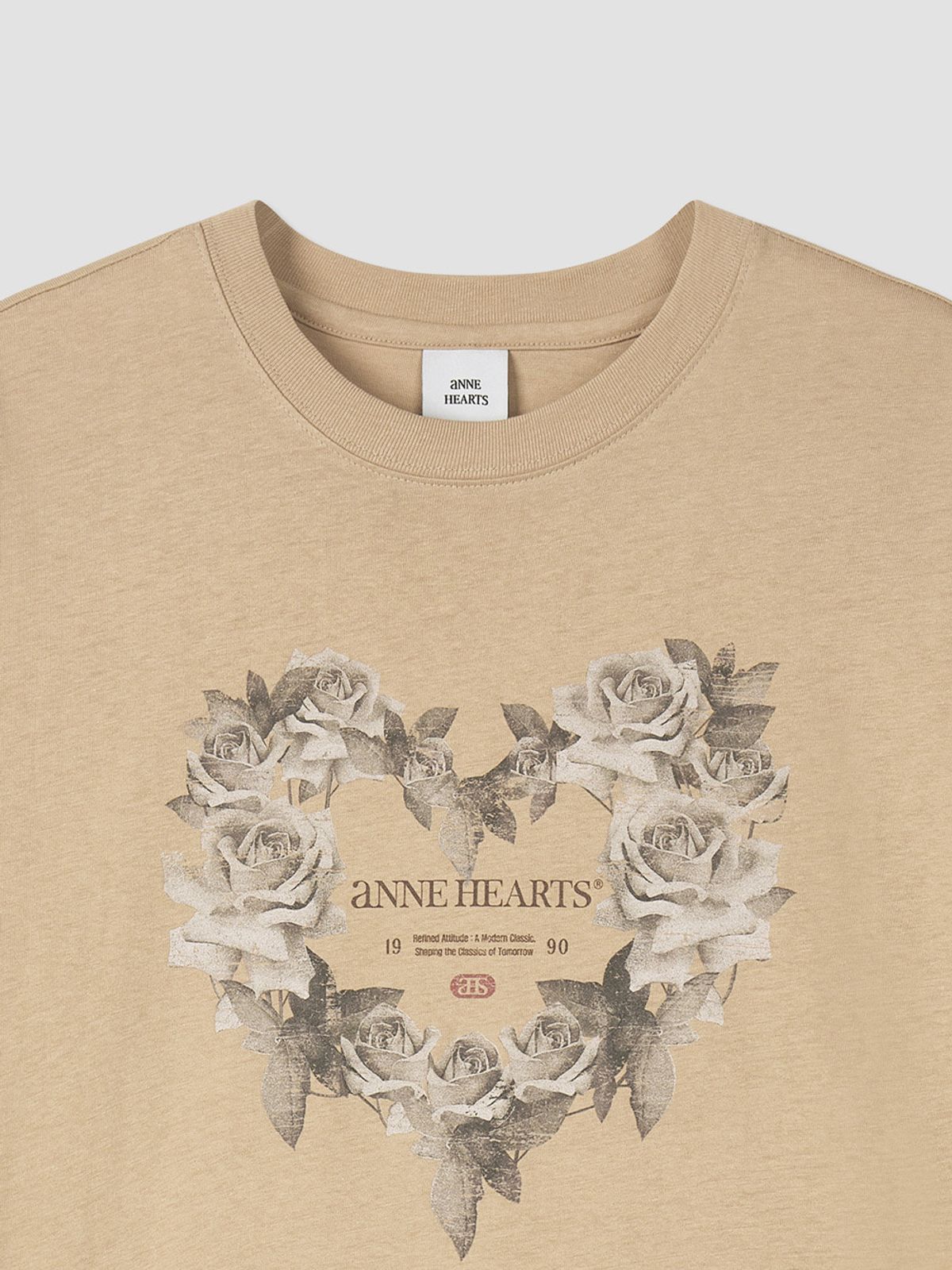 앤하츠(ANNEHEARTS) 하트붐 그래픽 반팔 티셔츠 베이지
