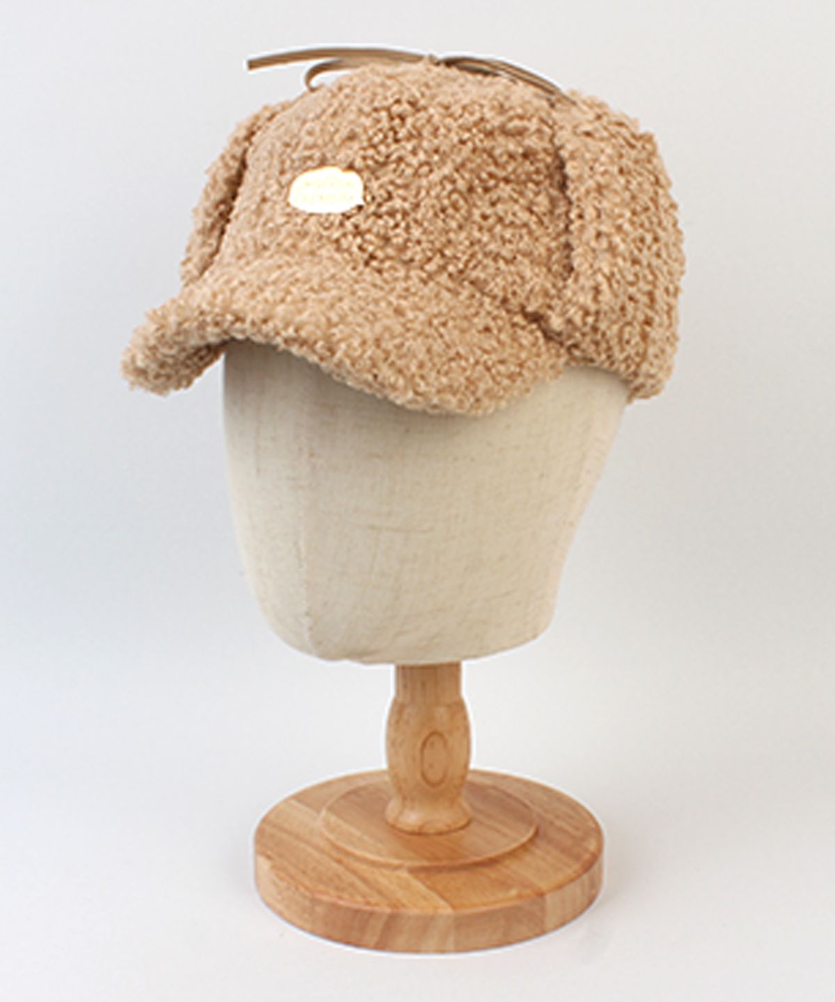 유니버셜 케미스트리(UNIVERSAL CHEMISTRY) Bubble Fleece Beige Earflap Cap  귀달이모자