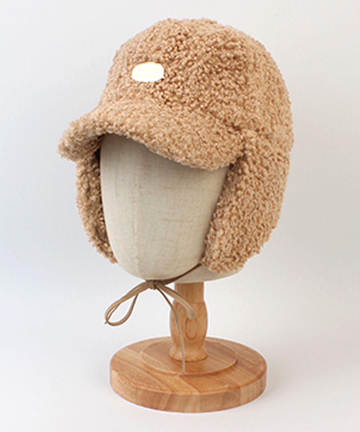 유니버셜 케미스트리(UNIVERSAL CHEMISTRY) Bubble Fleece Beige Earflap Cap  귀달이모자