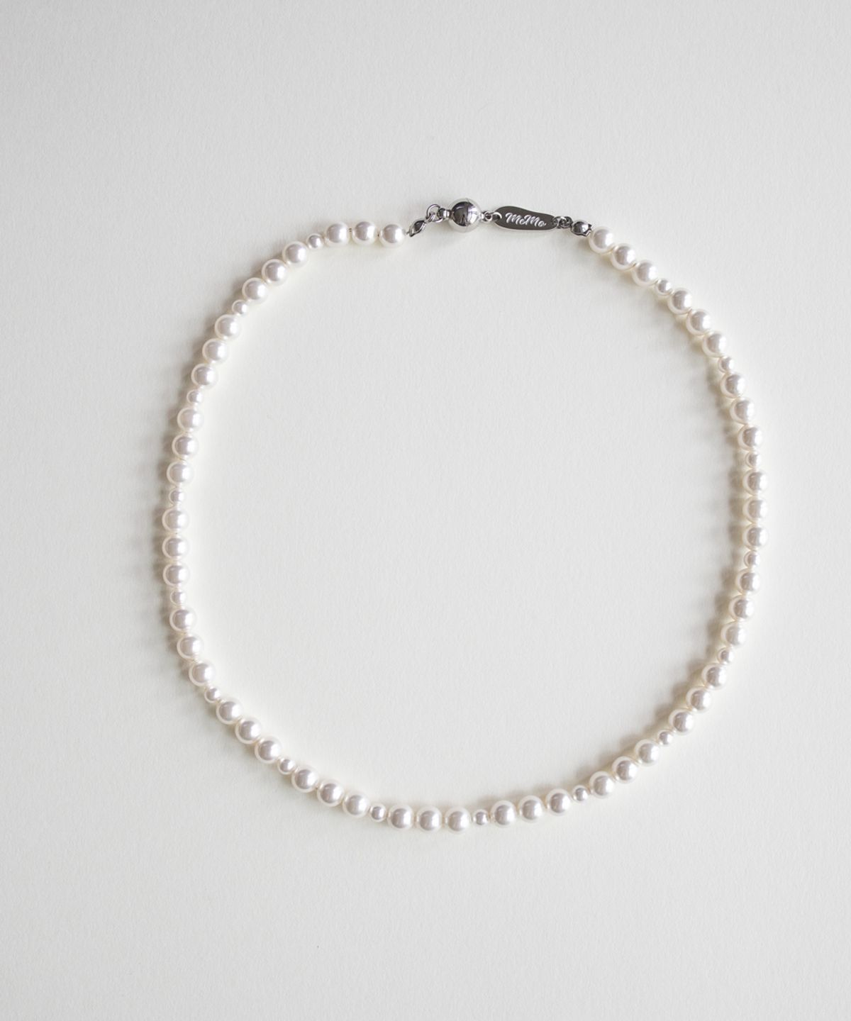 메리모티브(MERRYMOTIVE) White pearl rhythmical necklace